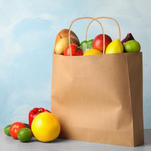 China Customized Logo Extra Large Flat Bottom Kraft Paper Bag for Groceries and Clothes Sale factory