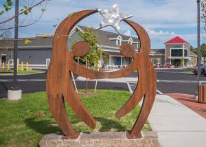 China Outdoor Corten Steel Sculpture Modern Park Welcome Metal Figure Rusty Finish factory