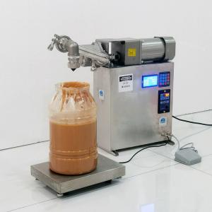 China Stainless Steel Liquid Filing Machine Small Automatic Oil Filling Machine factory