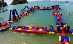 China Giant Island Inflatable Water Park Inflatable Floating Water Slides Anti UV factory