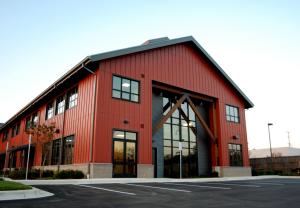 China Painted Or Galvanized Multi Storey Steel Frame Construction Building Workshop Garage Shed factory