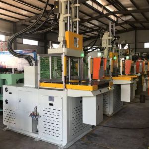 VERTICAL injection molding machine for automobile edge