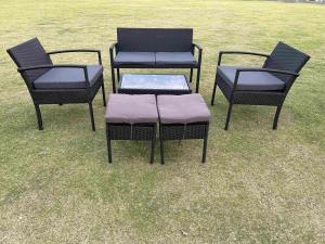 China 4 Or 6 Pieces Rattan Furniture Sets Outdoor Table And Chair ottoman stool Set Balcony Furniture Sets factory