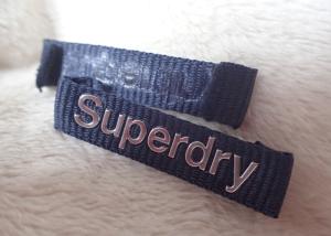 China Superdry 3D High Frequency Silver Logo Clothing Neck Label For Jackets factory