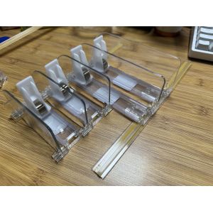 Upgrade Your Shelves with Our Spring-Loaded Shelf Pusher for Neat and Fully