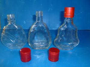 China clear glass bottle with screw cap/glass liquor bottle factory