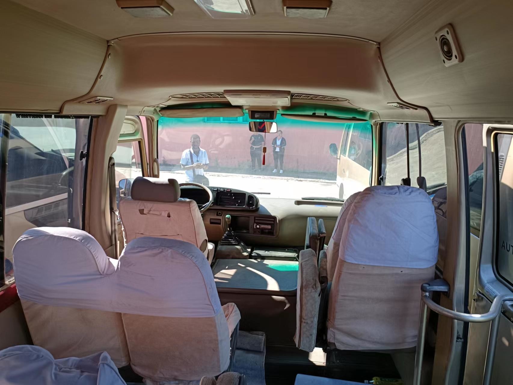 30 Seater Toyota Coaster Bus Japanese Mini Bus Open The Door Outside