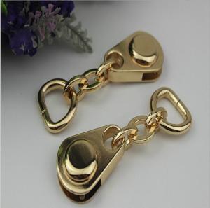 China Top quality zinc alloy light gold handbag zipper slider with iron d ring factory
