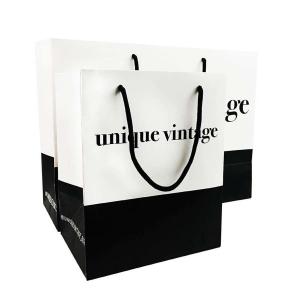 China OEM Customized Designs Luxury Matte Gift Shopping Paper Bag With Logo For Clothing Shoes factory