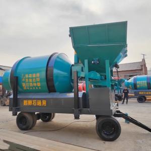 China 1000L Self Loading Concrete Mixer Twin Shaft Concrete Mixer Green factory