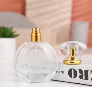 China SGS Round Transparent Perfume Bottle 50ml 60ml Glass Cologne Bottles factory