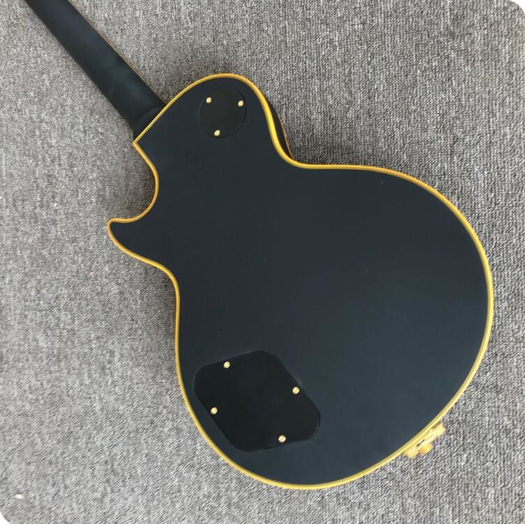 Grand LP electric guitar black with bigsby, yellow body binding, 3 pickups, gold hardwares