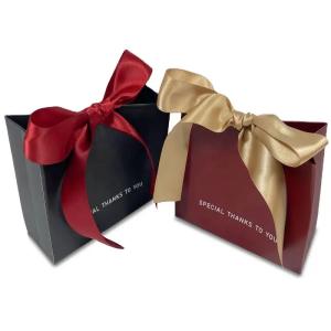 China Wholesale Modern Luxury Black Die Cut Paper Bags For Clothing Perfume Jewelry Gift Shopping Custom Logo Unique Design factory