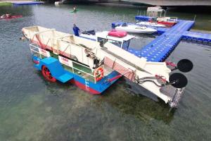 China Diesel Water Hyacinth Harvester Machine Vessel With 24 Cubic Meters Diesel Drive Gearbox Custom Building factory
