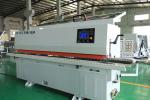 380V Automatic Woodworking Edge Banding Machine for Cabinet Making by Advertisin