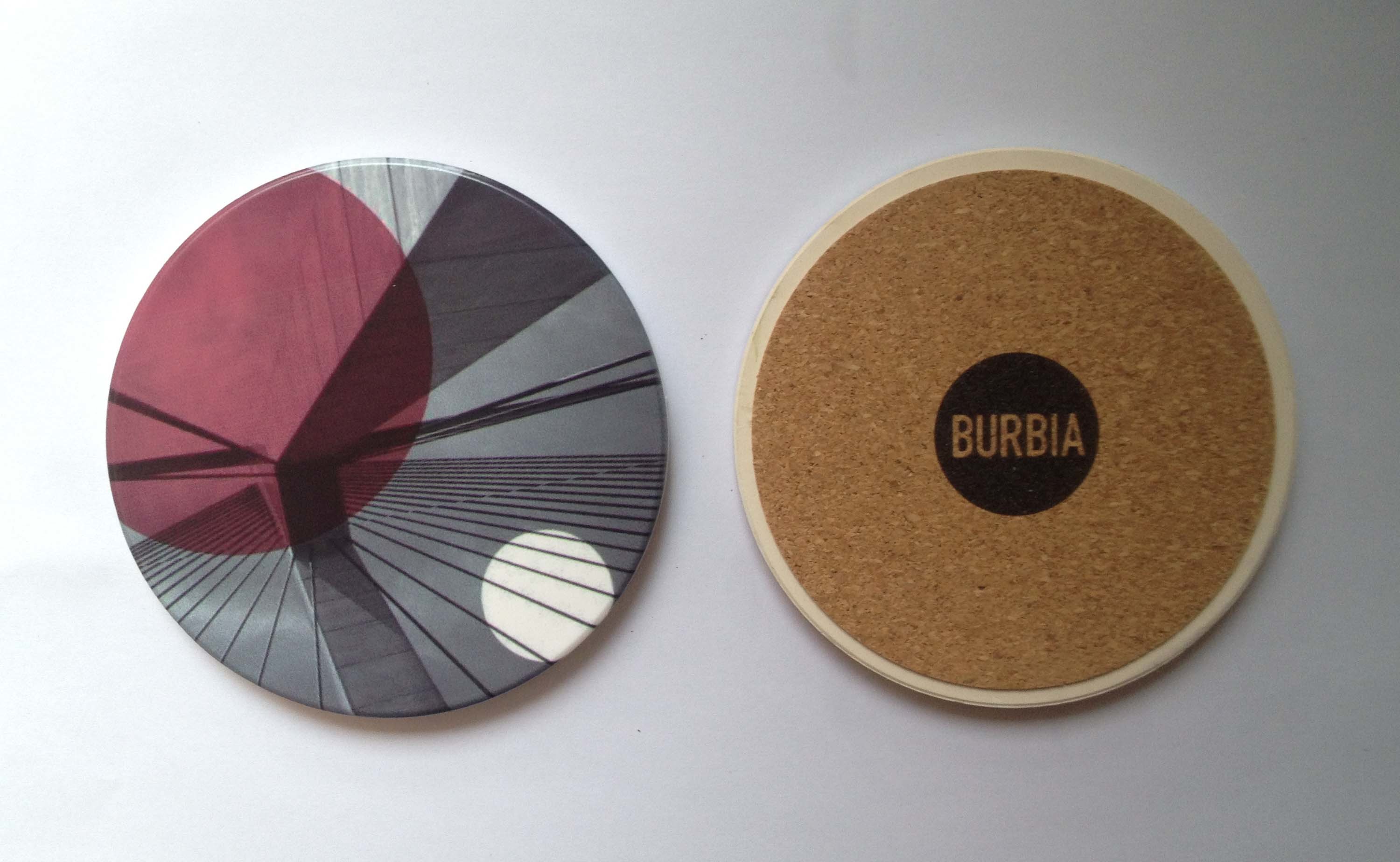Round ceramic coaster with cork backing and UV printed/ silkscreen logo