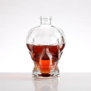 China Customize Sealing Type 750ml Skull Head Shape Wine Bottle for Home Bar Display Piece factory