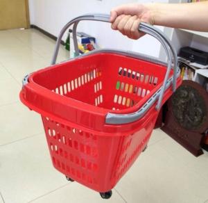 China Red Rolling Plastic Shopping Trolley Basket / Portable Storage Basket With Wheels factory