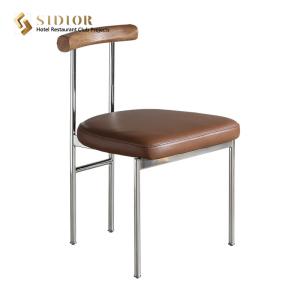 China Nordic Industrial Style Black Pu Leather Dining Chairs With Solid Wood Backrest factory