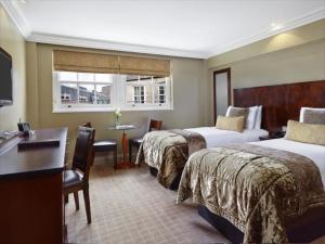 China Johor Interior design for hotel furniture by Mahogany wood bed with Combined desk table with TV cabinets factory