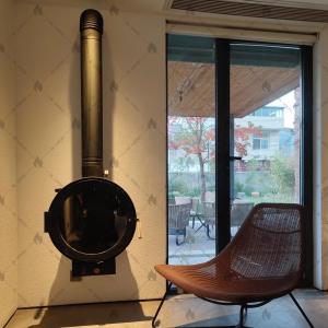 China ISO9001 Indoor Wood Burning Fire Pits Wall Mounted Suspended Wood Stove factory