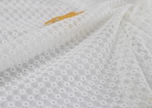 China Stabilizer Voile Embroidered Eyelet Polyester Lace Fabric For Wedding Dress factory