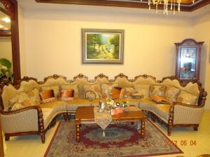 China Neoclassical Living Room Velvet Corner Sofas 9 Seater U Shaped Sofa 45kg/Cbm Sponge factory