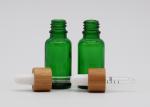Green Oil 18mm Cosmetic Glass Dropper Bottles With Bamboo Dropper Printing