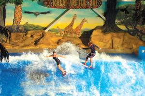 China Enjoying Flowrider Water Ride , Surfing Attractive Wave Skid Board / Aqua Park Amusement factory