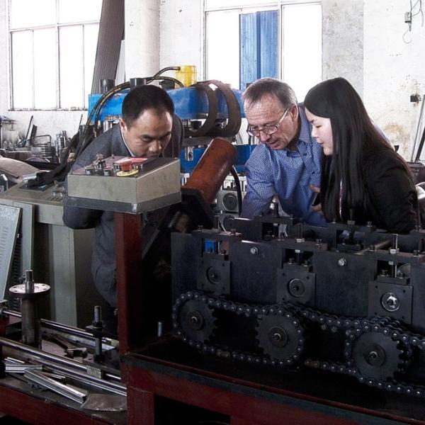 Aluminum Alloy 55mm PU Foam Roller Shutter Door Roll Forming Machine With Hydraulic Cutting 8