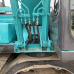 Kobelco SK140 Excavator from Japan with 0.57m3 Bucket Capacity and Low Working
