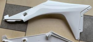 China Fuel Tank Side Cover Moto Spare Parts factory