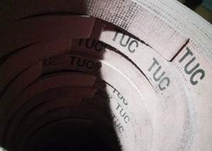 China Reddish Asbestos Woven Brake Lining Roll with Brass Wire Grinded for Farm Tractor factory