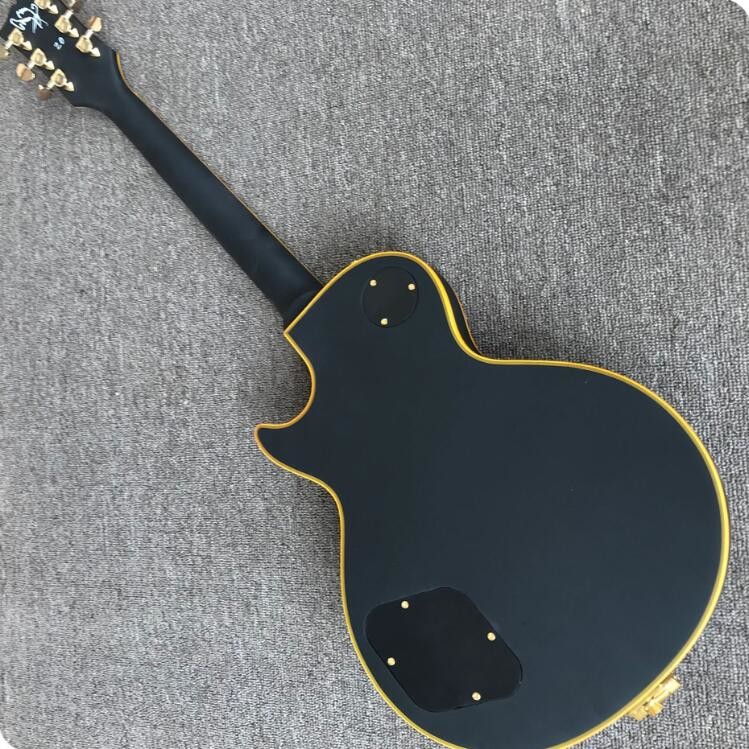 Grand LP electric guitar black with bigsby, yellow body binding, 3 pickups, gold hardwares