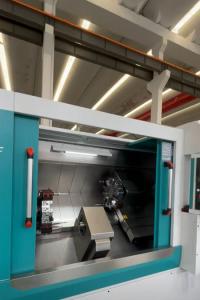 China Dual Head Inclined Bed CNC Horizontal Lathe Machine With 12 Station Servo Turrets factory