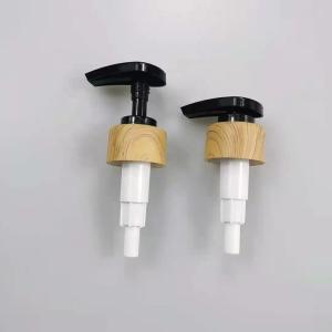 China Non-Refillable Shampoo Bottle Lotion Pump 24/410 28/410 with Bamboo Printing Lid factory