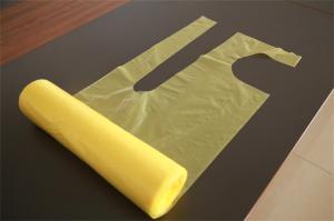 China Disposable Plastic Kitchen Aprons On A Roll , Throw Away Aprons Body Protection factory