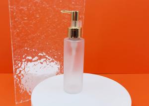 China Frosted Transparent Lotion Bottle 100ml With Gold Pump Cylindrical Shape PCR factory