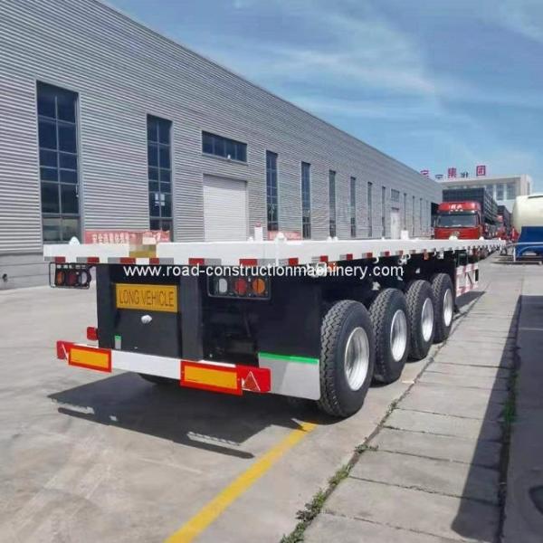 China Q345B Steel 60 Ton Flatbed Semi Trailer Shipping Container 12.00R22.5 Tire factory