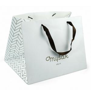 China Cheap gold foil makeup paper bag white craft square base paper bag factory