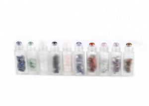 China Crystal Ball Gemstone Glass Roller Bottles With Gemstone Chips Inside factory