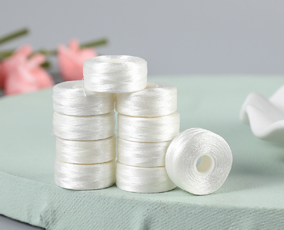 Pattern Dyed Polyester L Type Pre Wound WT60 75d/2 Side Less Bobbin Embroidery Thread