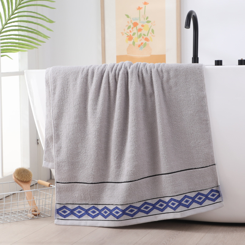 A Solid Color Rectangle Bath Towel for Adult Bathing a Replacement Advertising Towel