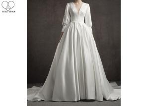 China Deep V Neck Vintage Off White Wedding Dresses Long Lantern Sleeve Pleating Tail factory