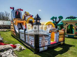 China Commercial Kingdom Pirates Slide Inflatable Blow Up Obstacle Course With Bouncer factory