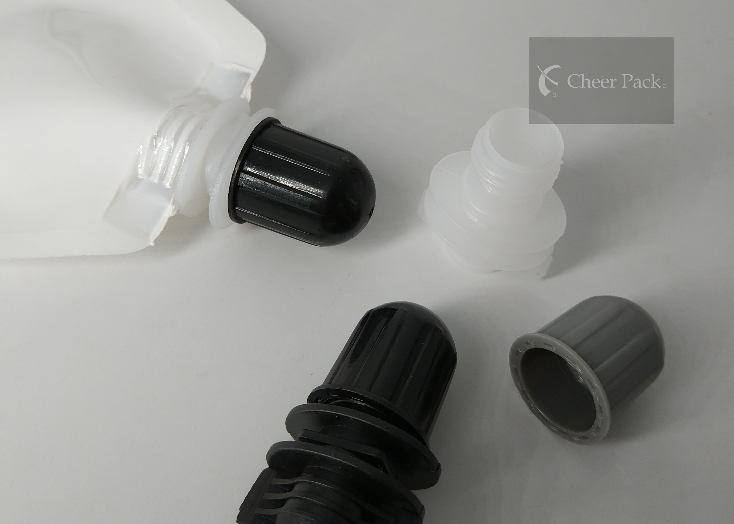 Hair Care Products Pour Spout Caps With Black PE Material , OEM ODM Service