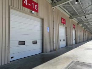 China Sectional door gives maximum drive through width and height when open unlike other garage doors factory