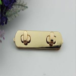 China Classic design light gold purse double twist turn metal locks factory