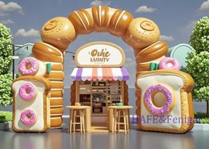 China Custom PVC Outdoor Shopping Mall Store Inflatable Advertising Decoration Bread Donut Arch factory