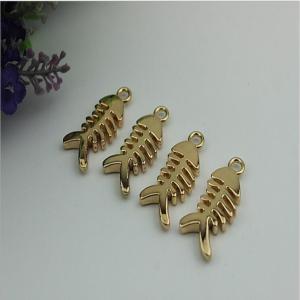 China Small light gold fish bones pattern zinc alloy metal handbag logo label tags for sales factory